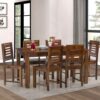 Handcrafted sheesham wood dining table with elegant design.